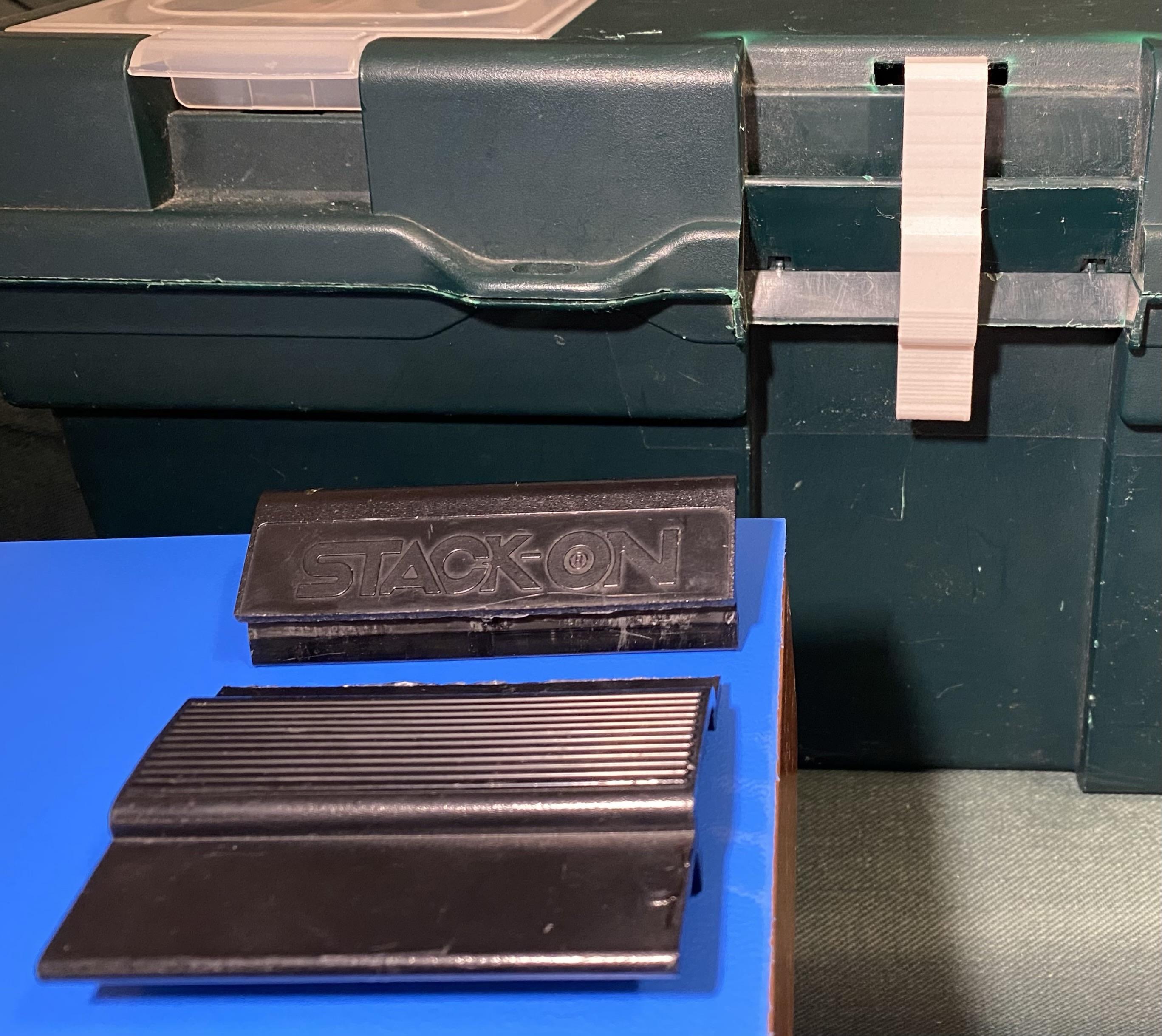 my small toolbox, the broken clasp, a thin test print of a new replacement I’ve been making, put on the toolbox and working even though it’s not done yet