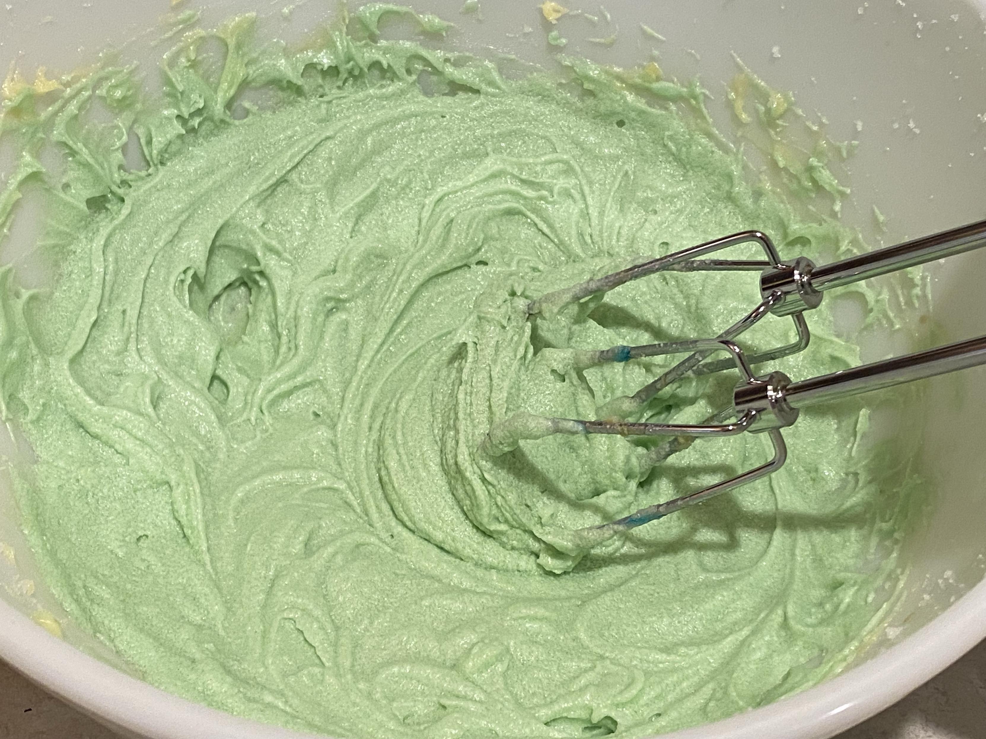 all the wets together making kind of a green butter/sugar/wets mix, whipped up nicely