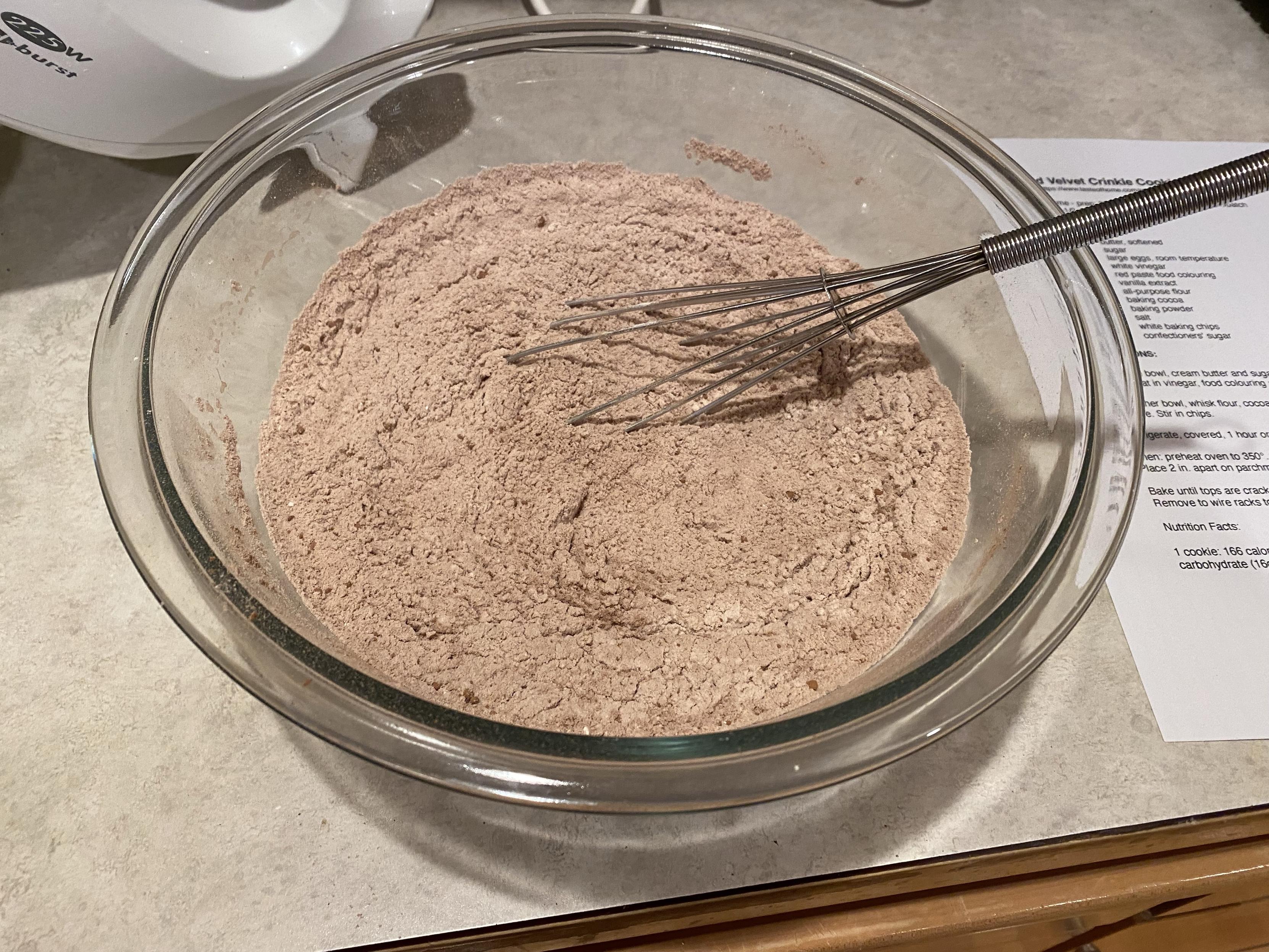 a bowl of flour, cocoa, salt, and baking powder mixed together