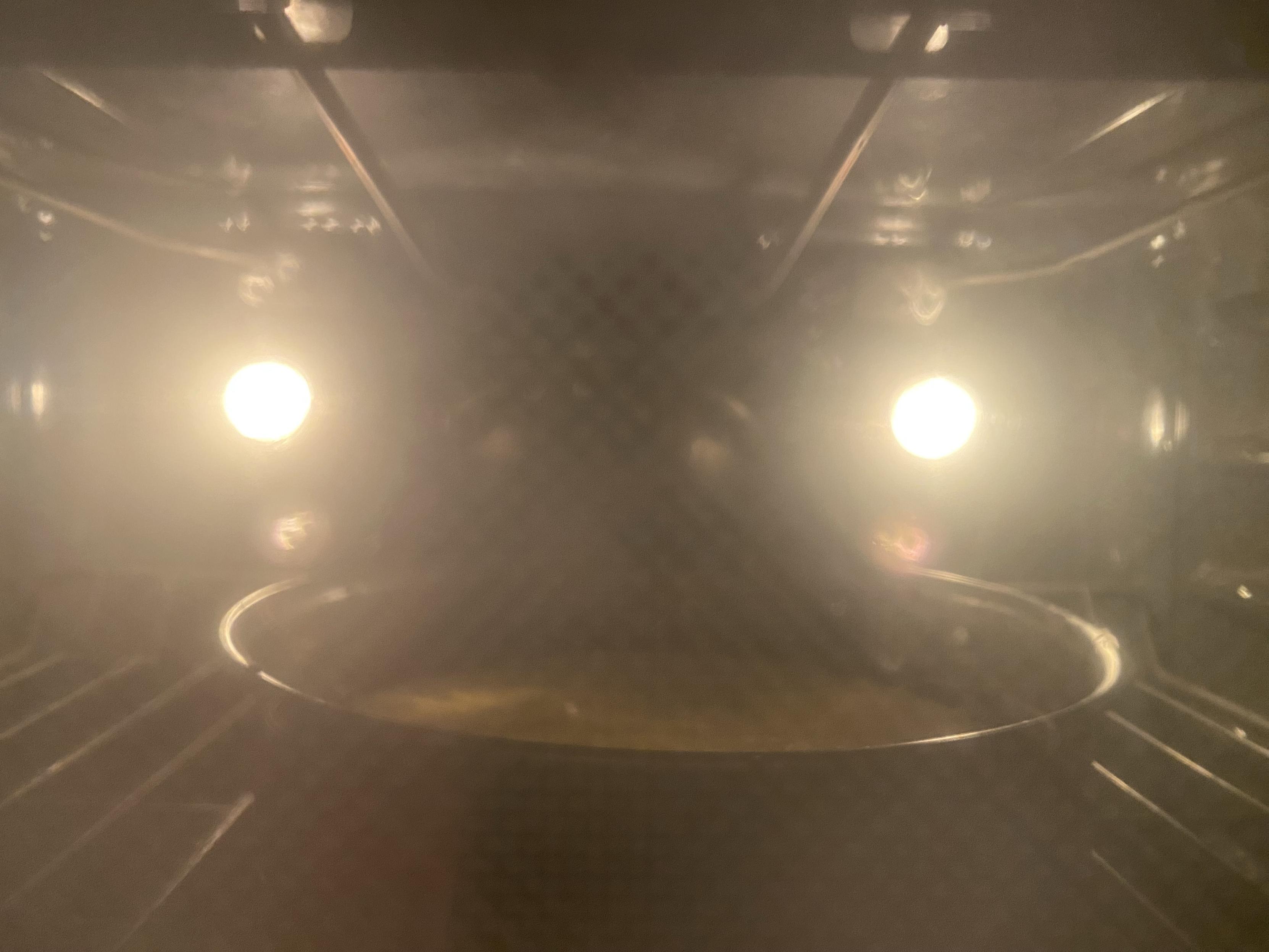 the cake, more visible and higher along the cake pan edges now