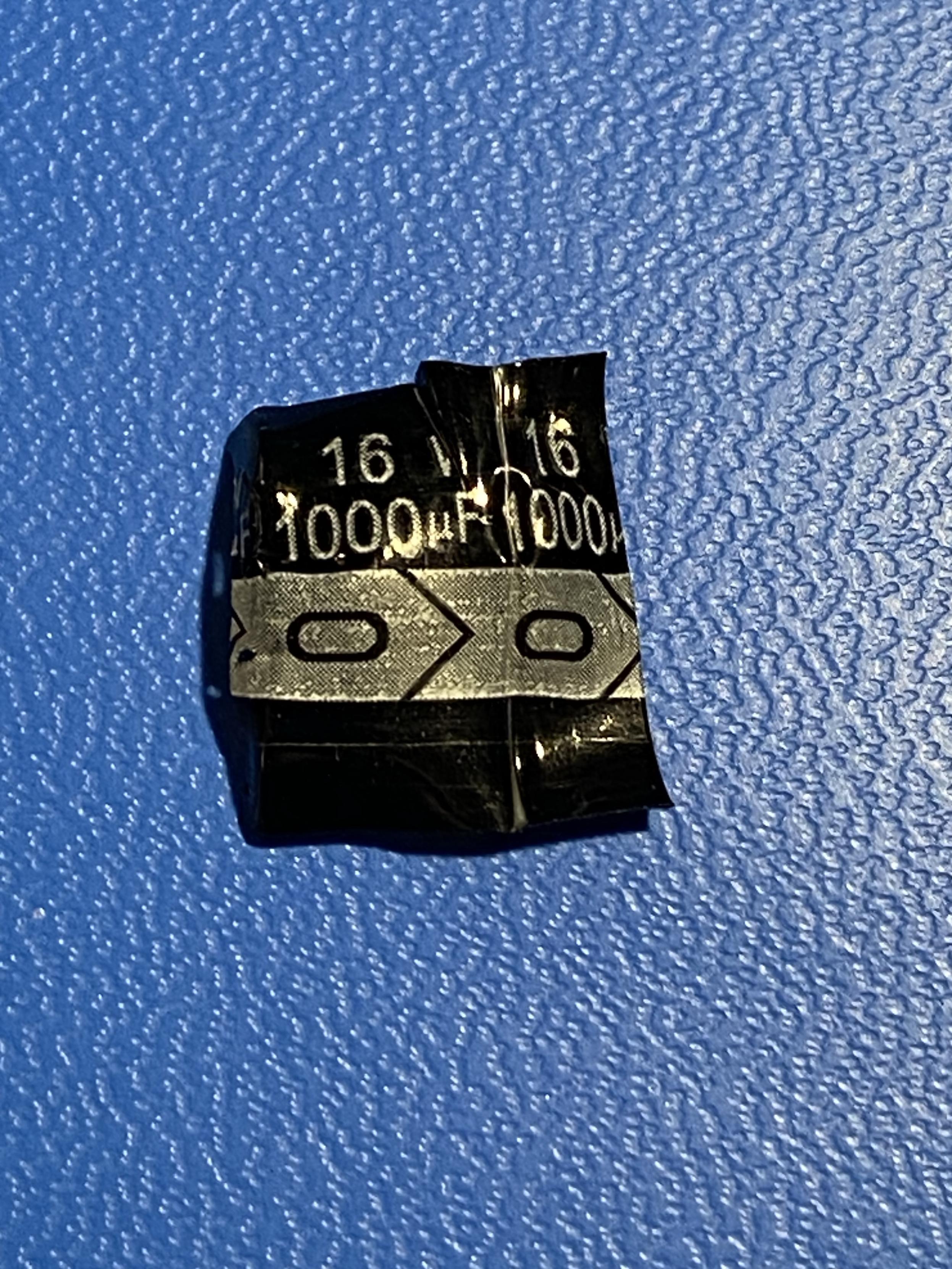 part of the capacitor wrapper showing 16 volts at 1000 microfarads