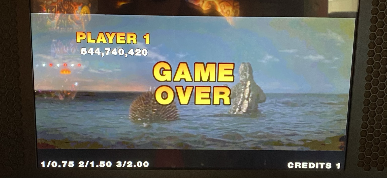 The “Game Over” screen of Godzilla pinball shows Godzilla and Anguirus fucking off into the ocean. The score displays 544,740,420
