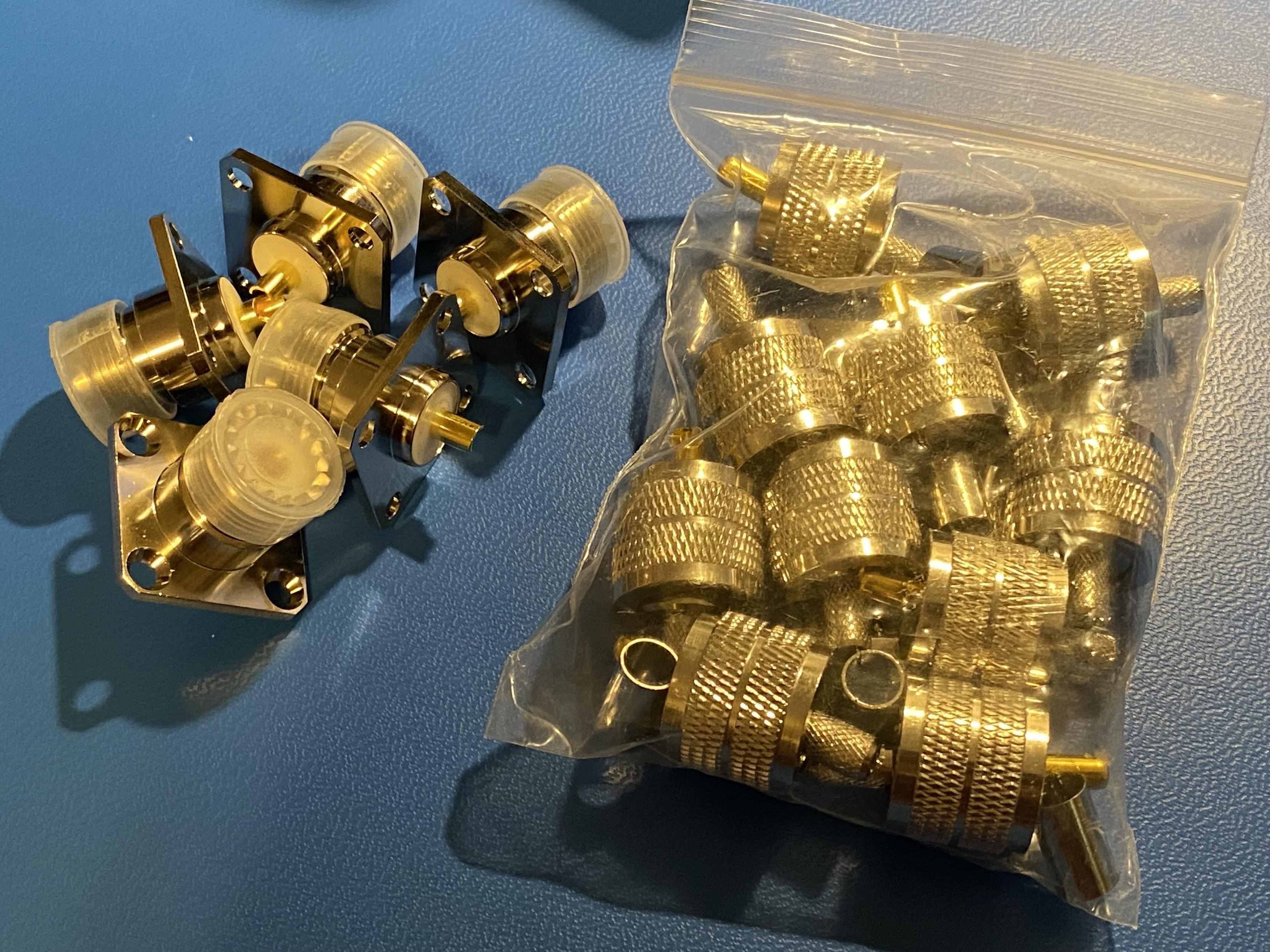 ten male UHF cable ends and five female cabinet mounts for UHF female connectors