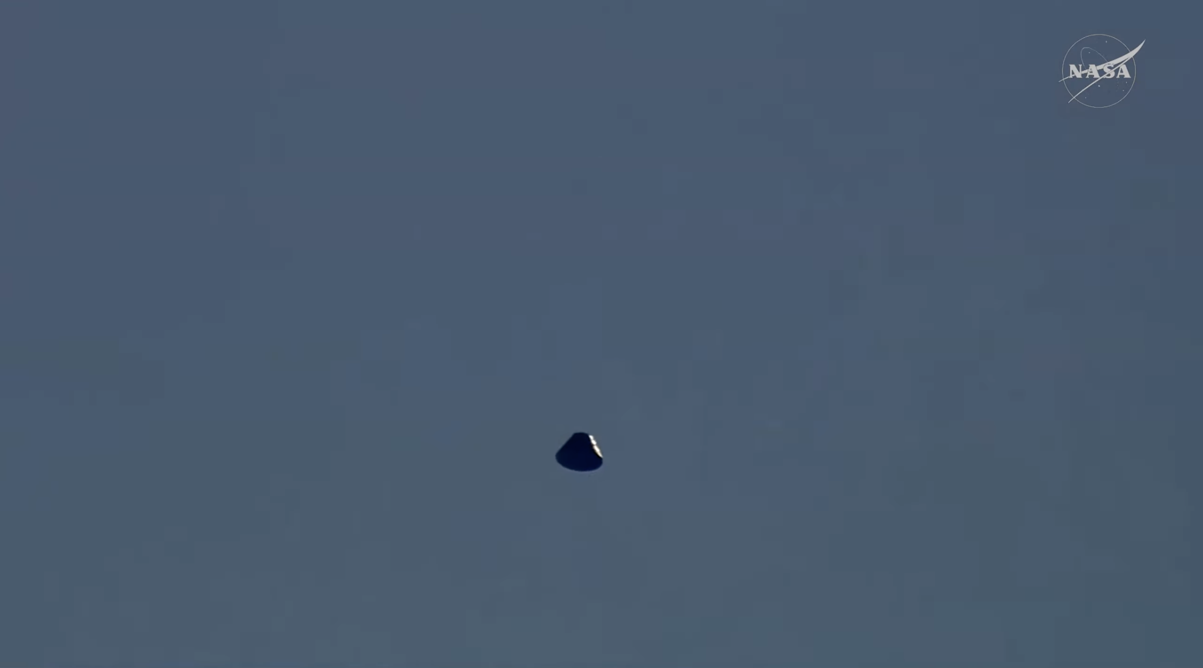 Integrity, back when it was still incoming but without parachutes yet deployed, looking like an SFX shot from the TV show UFO (1969).