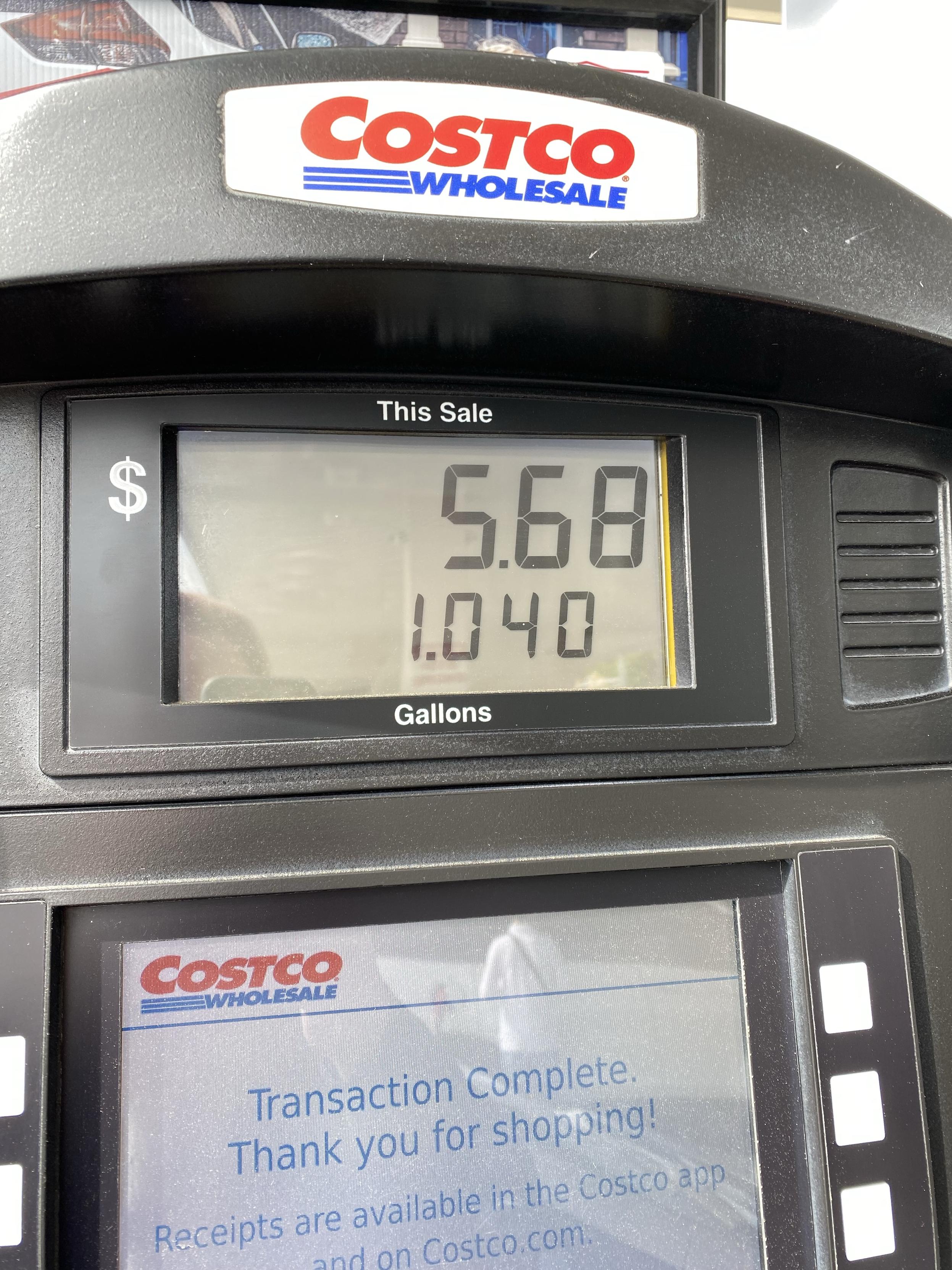 a gas pump showing a cost of $5.68 for the month and 1.04 gallons used over the same period