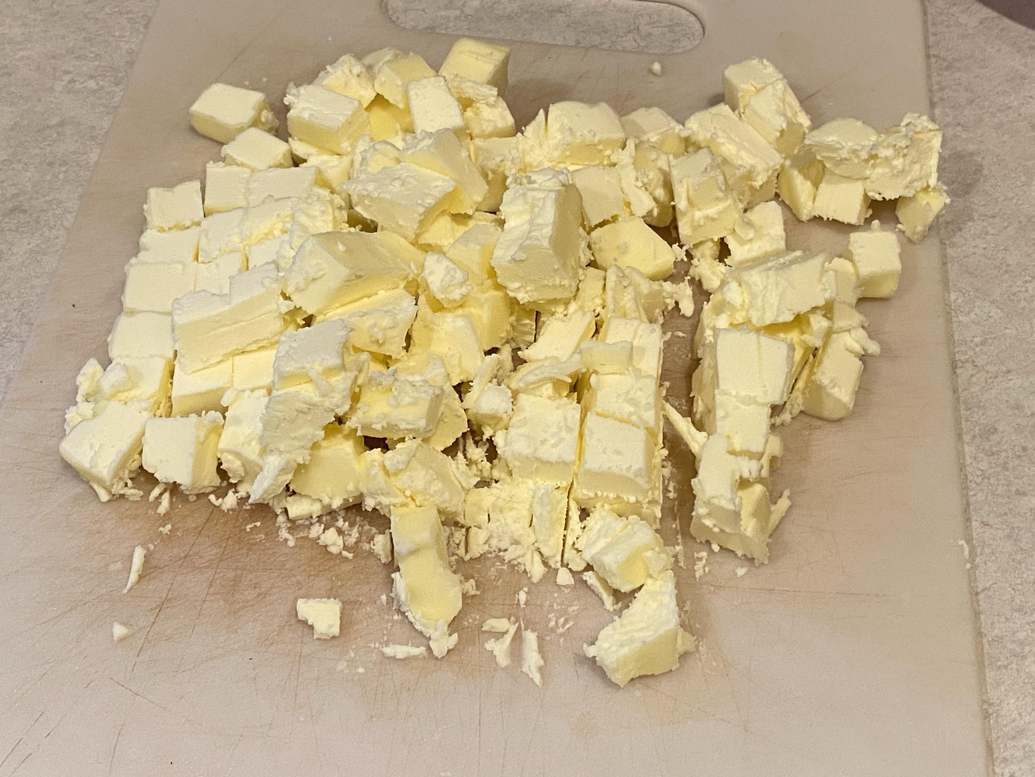 two sticks of unsalted butter cut up into cubes