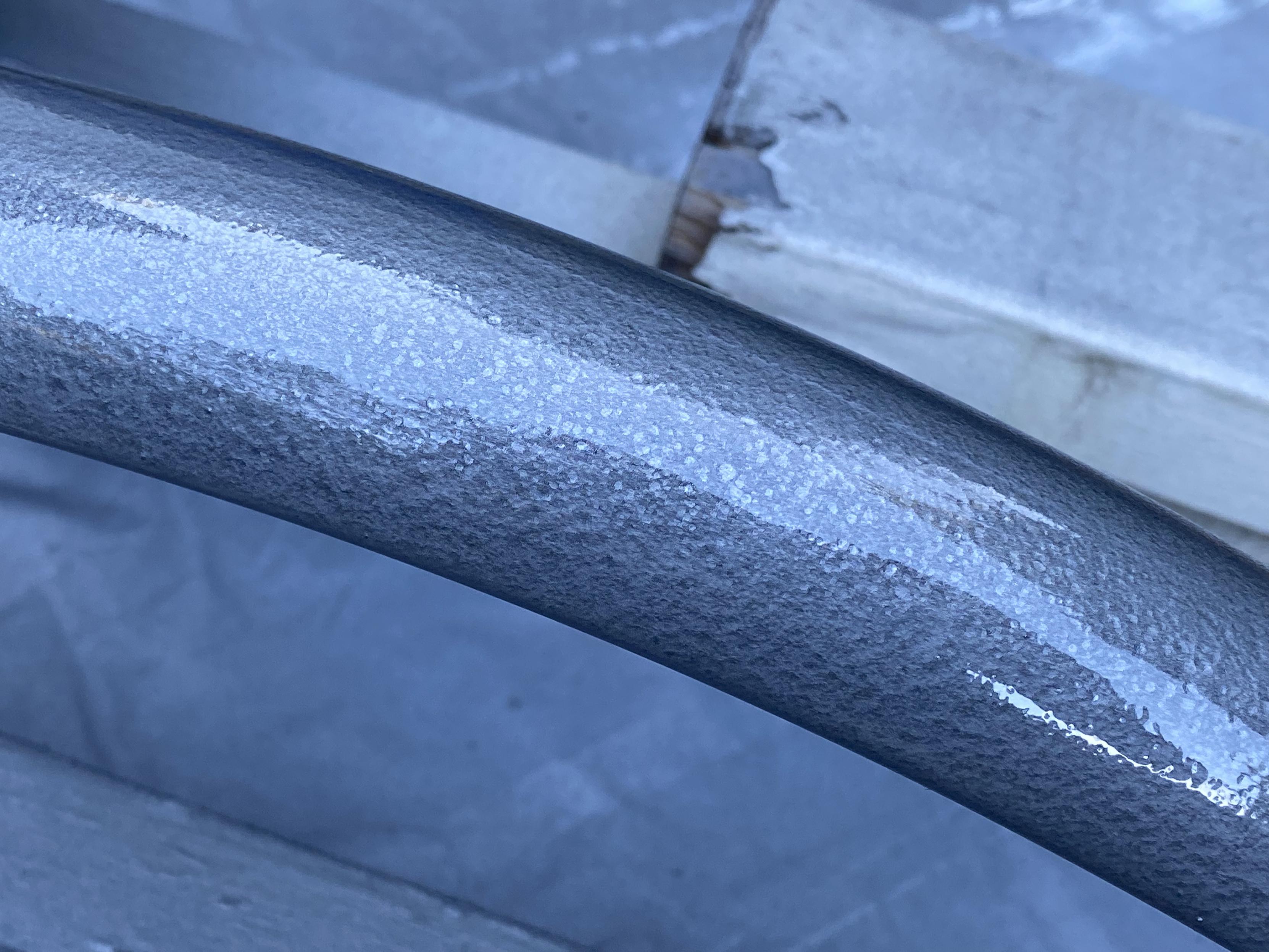 closeup of the larger fender's texture, which does have a different character to it, possibly related to the differing patterns of rust pits in the chrome underneath